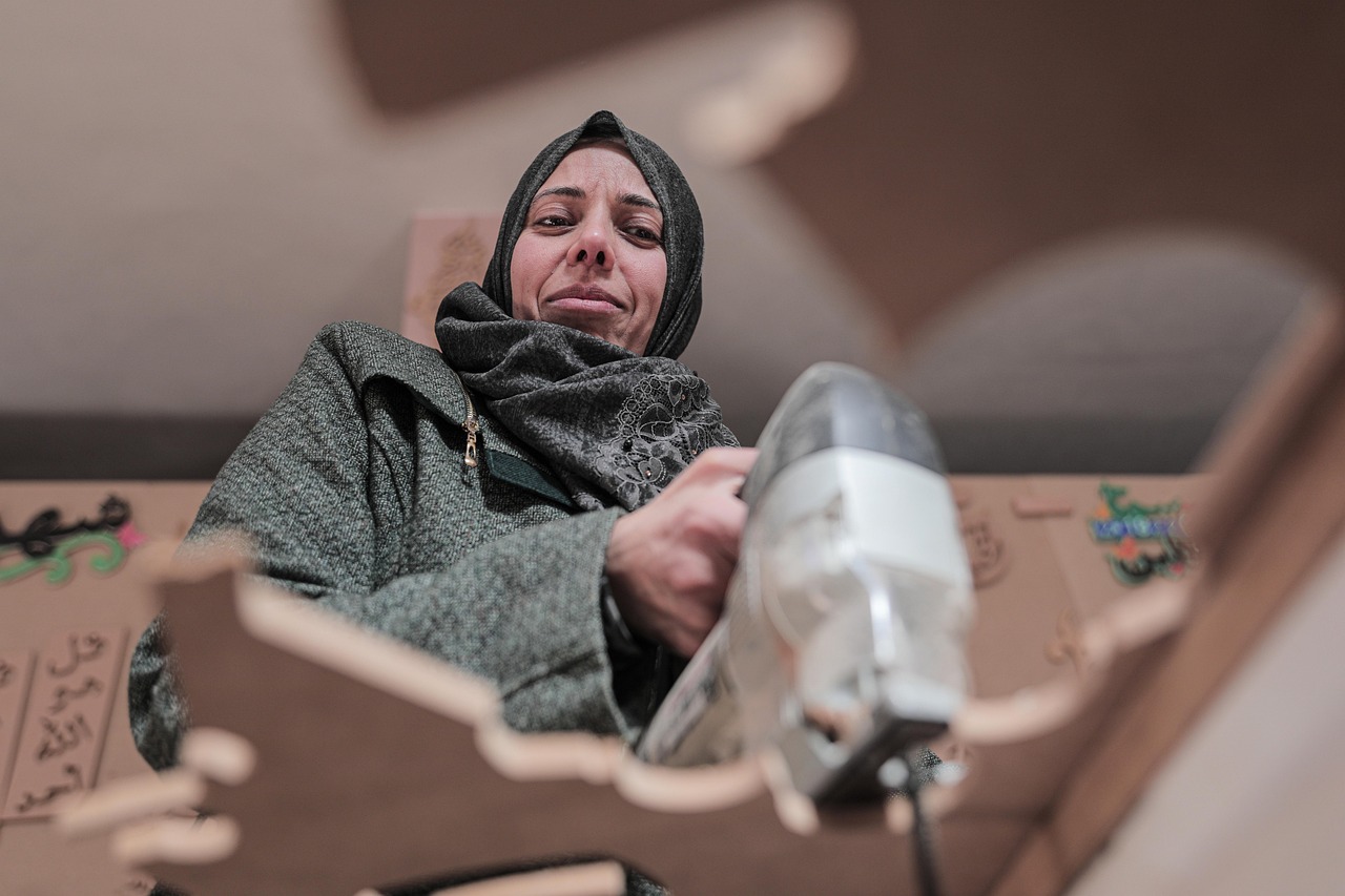 woman, hijab, worker, factory worker, drill, drilling, woodworker, woodworking, tool, machine, workshop, palestine, portrait, hijab, hijab, hijab, hijab, factory worker, drill, woodworking, woodworking, palestine, palestine, palestine, palestine, palestine
