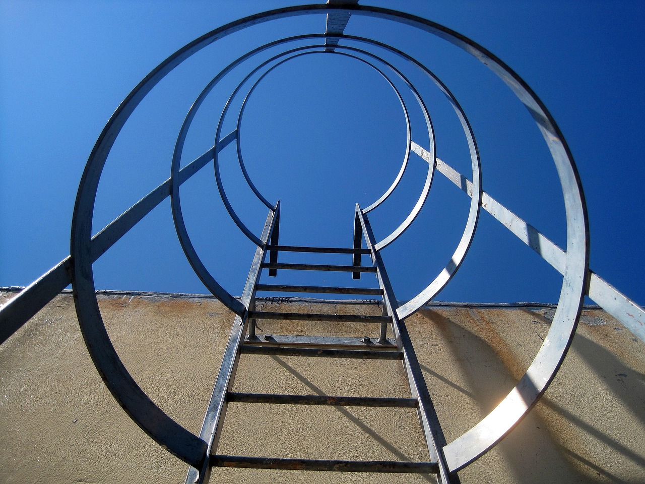 metal stairs, stairs, upright, access, metal, ladder, fixed, protected, circular, cylinder, exterior, wall, sky blue, blue wall, blue metal, ladder, ladder, ladder, ladder, ladder