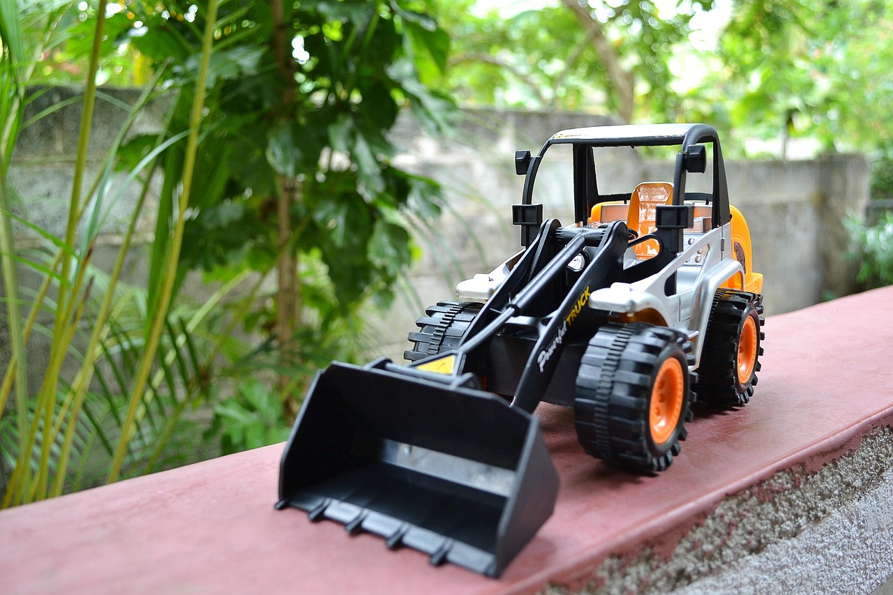 toy, plastic, dozer, backhoe, close-up, wheels, construction, yellow, sri lanka, ceylon, mawanella, green construction